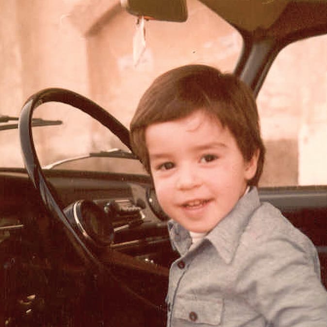 A kid inside a car